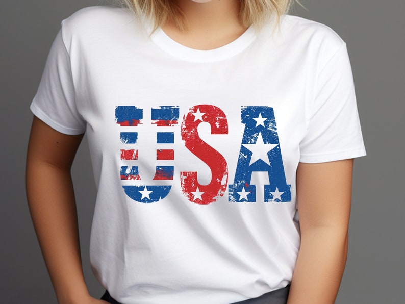 May include: White t-shirt with a distressed red, white, and blue "USA" graphic.