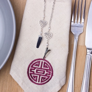 Filigree heart napkin chain