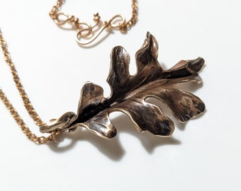 Forged bronze oak leaf pendant