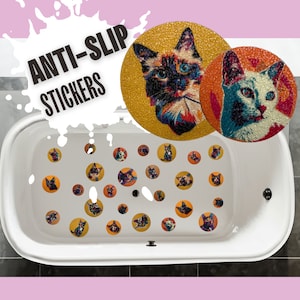 May include: A white bathtub with a variety of colorful cat-themed anti-slip stickers on the bottom. The stickers are round and feature different cat breeds. The text "ANTI-SLIP STICKERS" is visible in the top left corner of the image.