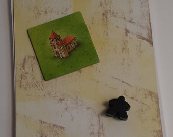 Carcassonne notebook with black Meeple