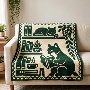 May include: A rectangular crochet blanket featuring a dark green and cream color scheme. The design displays cats, bookshelves, potted plants, and steaming mugs of coffee. A decorative border with a repeating leaf pattern frames the entire piece.