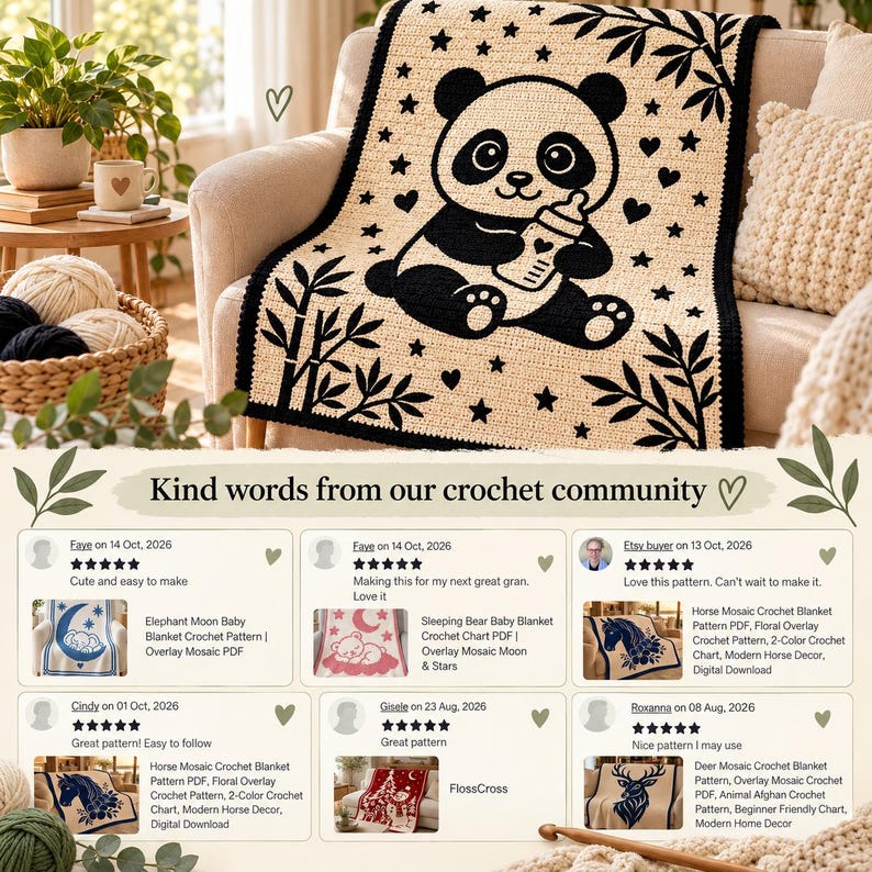 May include: A cream-colored crochet blanket featuring a black panda graphic holding a baby bottle, surrounded by stars, hearts, and bamboo stalks. The blanket has a solid black border and is draped over a chair with yarn nearby.