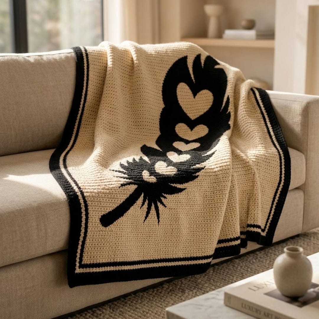 Feather of hearts overlay mosaic crochet blanket pattern in cream and black