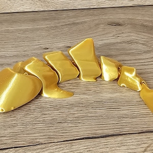 Animali in stampa 3D. Regali per feste. Oggetti di varie forme e colori. Giocattoli originali per eventi. Pensieri per bambini.