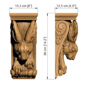 May include: Two wooden corbels, each carved with a rabbit design. The corbels are 36 cm tall, 15.3 cm wide, and 12.5 cm deep. The rabbit is depicted with detailed fur and features.