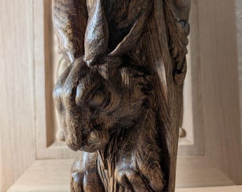 Candelabro clásico de madera con forma de cabeza de conejo. El precio es por unidad.