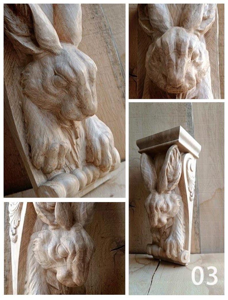 May include: A set of wooden corbels, each featuring a detailed carving of a rabbit. The rabbits are shown with textured fur and facial details. The wood is a natural light brown, and the corbels are mounted on wooden planks.