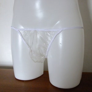 May include: A clear plastic underwear with a white elastic waistband.