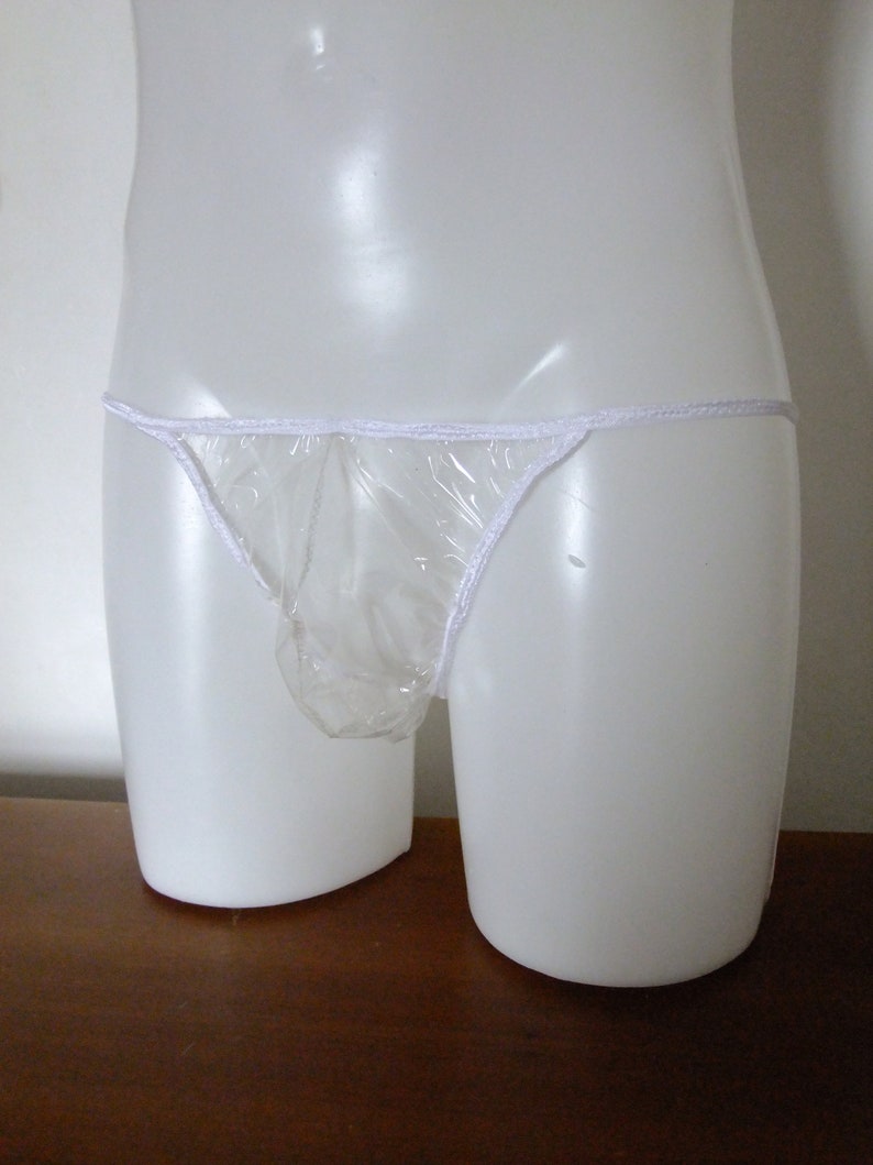May include: A clear plastic underwear with a white elastic waistband.