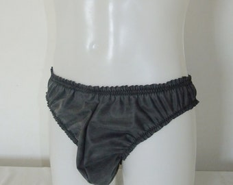 May include: Gray underwear with a ruffled edge.