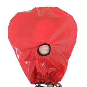 May include: A red, shiny, plastic hood with a black elastic band around the mouth opening. The hood is gathered at the bottom with a black elastic band. The mouth opening reveals a pair of lips.
