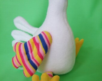 striped sock and plushie chicken