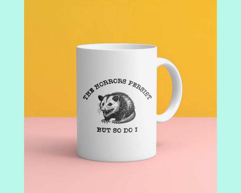 Funny Possum Mug - "The Horrors Persist So Do I" Ceramic Cup, 11 Oz, White, Novelty Gift