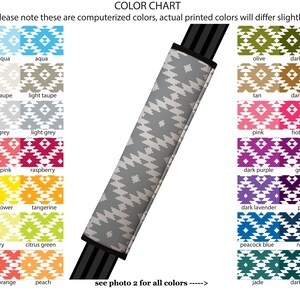 May include: Colour chart showing 24 different colours with a geometric pattern. Each colour is labelled with its name. The text "*please note these are computerised colours, actual printed colours will differ slightly" is at the top of the chart. The text "see photo 2 for all colours ----->" is at the bottom of the chart.