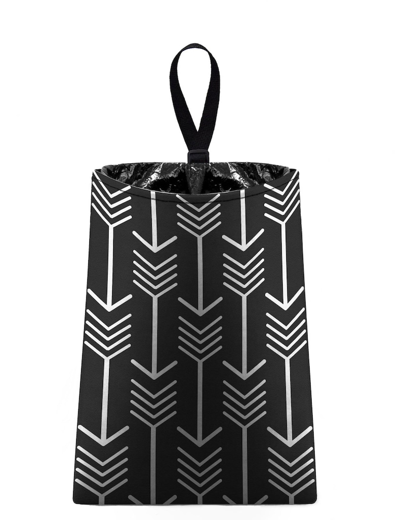 May include: Black fabric bin with a white arrow pattern and a black handle.