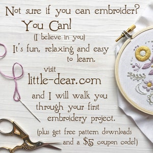 May include: An embroidery hoop with a floral design, needle, thread, and scissors are arranged on a light wood surface. Text reads "Not sure if you can embroider? You Can!" and "little-dear.com".