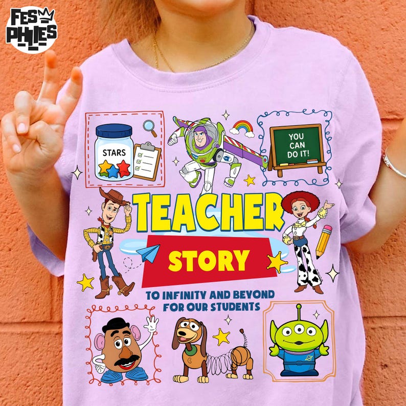 May include: A light purple t-shirt featuring cartoon characters and the text "TEACHER STORY". The design includes images of Buzz Lightyear, Woody, and other characters, with the phrase "TO INFINITY AND BEYOND FOR OUR STUDENTS".