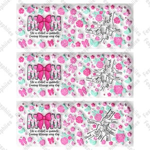 May include: Three pink and white mugs with a floral design and the word "MOM" in pink with a pink bow. The mugs also have a design of hands holding each other with names written on each hand. The text on the mugs reads "She is clothed in gratitude, Counting blessings every day."