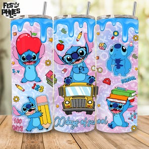 May include: Three stainless steel tumblers with lids and straws feature a blue cartoon character design. The design includes apples, pencils, and the text "100 days" and "School". The tumblers have a light blue and purple background.