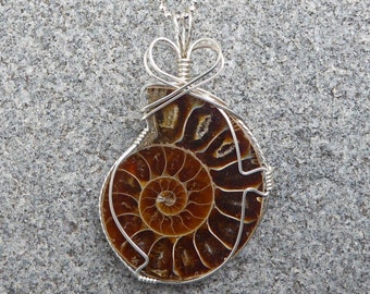 garnet and 3 metal pendant with a Tree of Life wirewrapped on to Jasper pendant. Trees in the Forest is a jasper