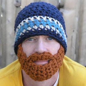 May include: A blue and white crocheted hat with a matching brown crocheted beard.