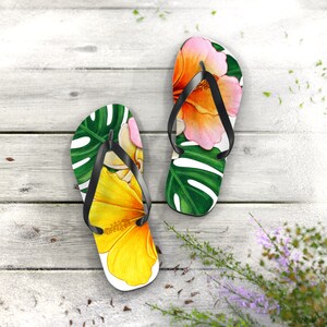Green, yellow and pink flip flops with a tropical vibe.Acheerful summer essential.adding fun to your summer wardrobe.