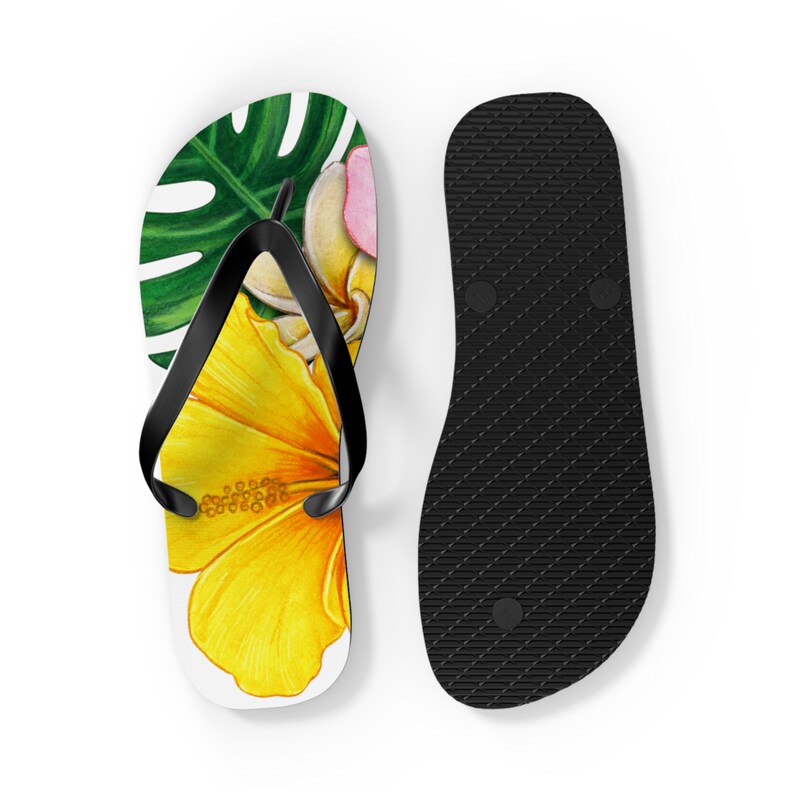 Green, yellow and pink flip flops with a tropical vibe.Acheerful summer essential.adding fun to your summer wardrobe.