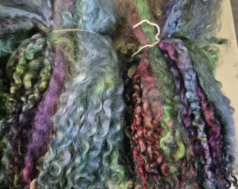 Teeswater locks handpainted longwool lamb locks that are about 8 to 10" long.   Tail spin doll hair dreadlocks embellishments 28 gr GEMSTONE