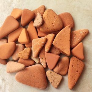 32 triangle sea terracotta shards, pebbles.Naturally polished sea terracotta bricks. 2cm-4,5cm .Mosaic,pebble art,decoration, terrarium