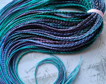 Extensiones de rastas sintéticas azules y moradas: trenzas DE de doble punta