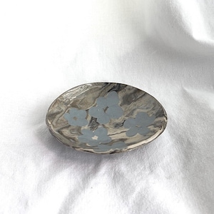 Handmade ceramic bowl emptier