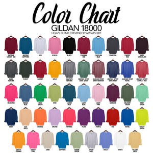May include: Color chart of Gildan 18000 heavy blend crewneck sweatshirts in various colors, including Antique Cherry Red, Ash, Black, Carolina Blue, and more. Each sweatshirt is displayed on a hanger, showcasing the wide range of available hues.