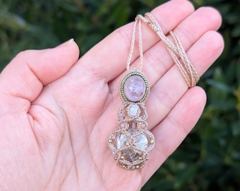 Macrame necklace with real snake skin in a glass vial featuring morganite and labradorite, snake skin gemstone necklace.
