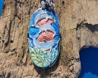 Wonderful Pod of Dolphins Swimming in the Ocean Pendant