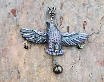 Flying Crow Raven Pendant Handmade and shimmers in the light.