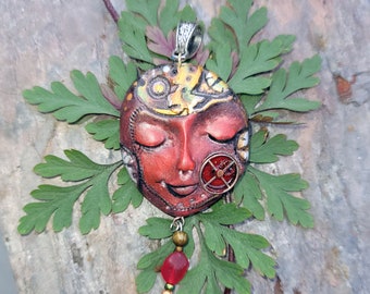 Ruby Red Kinetic Steampunk Robot Face Pendant with antique gears hand sculpted and painted