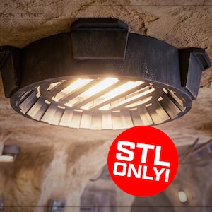 May include: A dark gray, industrial-style ceiling light fixture with a circular design. The light has a series of angled, metallic blades around the light source. The text "STL ONLY!" is in a red circle. The fixture is mounted on a textured ceiling.