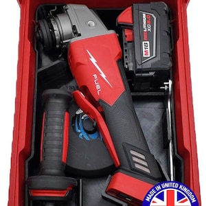 May include: A red and black power tool set, including a grinder, battery, and handle, stored in a red case with a clear lid. The grinder has "FUEL" text. The case has a "Made in United Kingdom" sticker. The case is approximately 40 cm long.