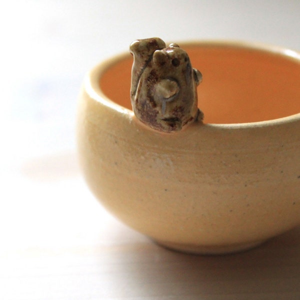 Squirrel on a Tiny Little Yellow Bowl