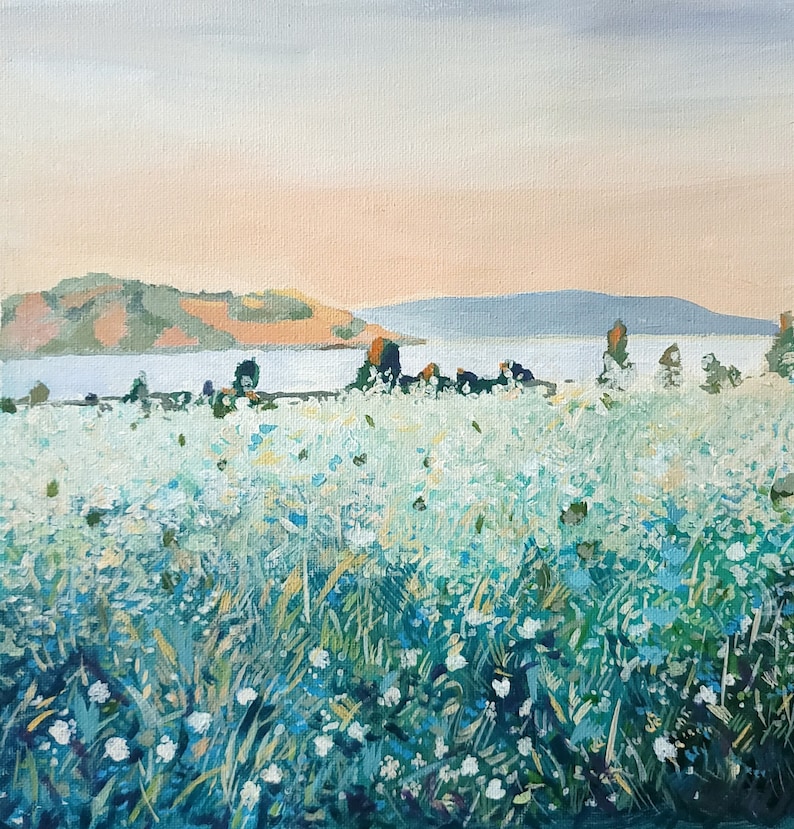 May include: A painting depicting a field of white flowers in the foreground, with a body of water and a distant hillside in the background. The sky is a soft pink and blue.