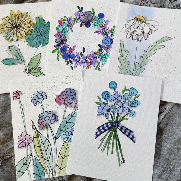 5 Individually hand painted 3-dimensional watercolor note cards in a blue palette.