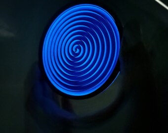 Fluorescent Spiral Coasters. Glow in the Dark, Stackable, Condensation Catching Drink Holders.