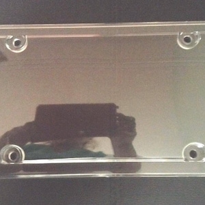 Vanity license plate protector Shields