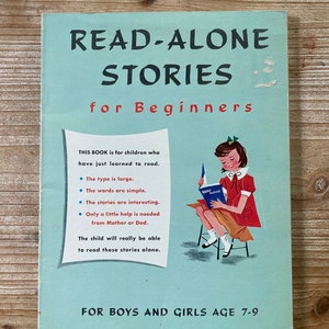 May include: A blue and white book cover with the title "Read-Alone Stories for Beginners". The cover features a young girl sitting on a stool reading a book. The text on the cover states that the book is for children who have just learned to read and that the type is large, the words are simple, the stories are interesting, and only a little help is needed from a parent. The book is for boys and girls ages 7-9.