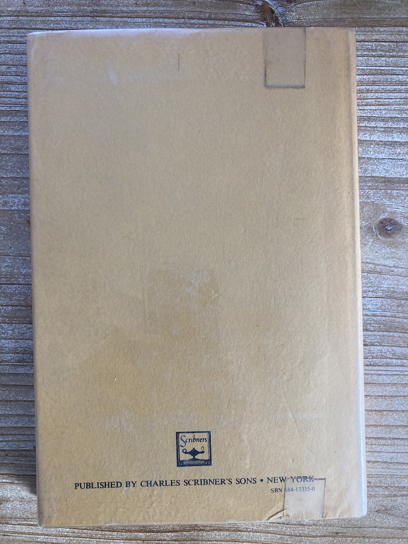 May include: The back cover of a tan-colored book with the text "Published by Charles Scribner's Sons &bull; New York" and the ISBN number "684-13335-0".