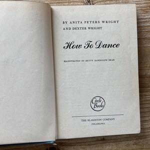 May include: Open book with the title "How To Dance" by Anita Peters Wright and Dexter Wright. The book is illustrated by Betty Randolph Bean and published by The Blakiston Company in Philadelphia. The Circle Books logo is visible.