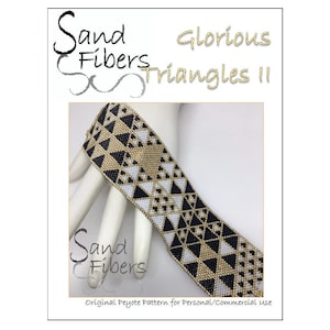 May include: A beaded bracelet with a geometric pattern of black, white, and gold triangles. The bracelet is called "Glorious Triangles II" and is an original peyote pattern by Sand Fibers.