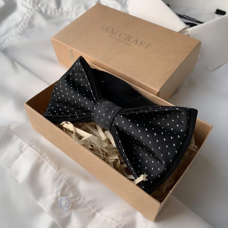 mens black bow tie and suspenders