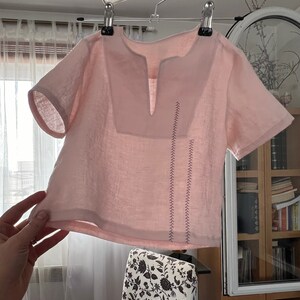 Handmade minimalist style children's linen blouse with embroidery